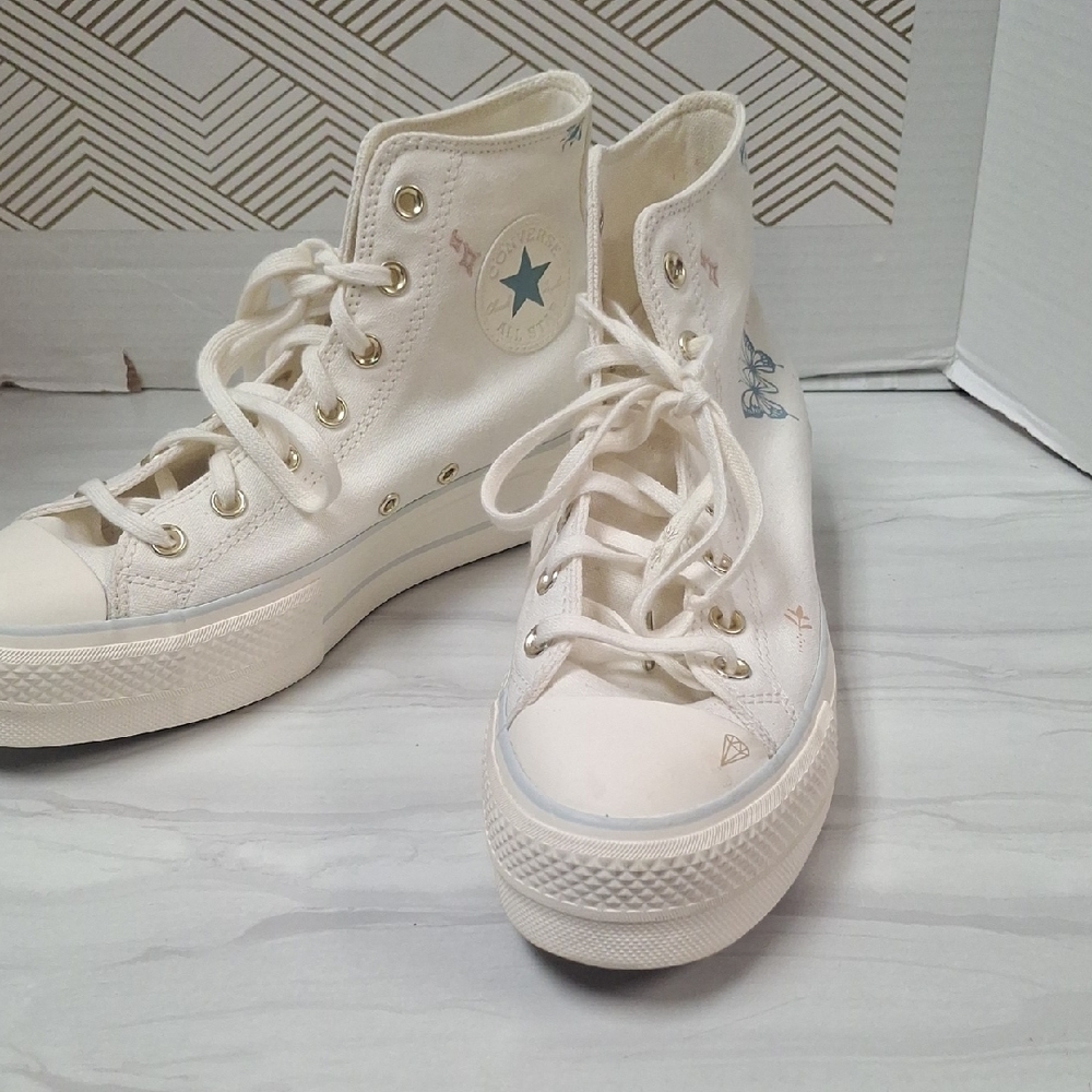 Converse White High-Tops with Blue Star